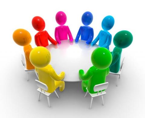 Human outlines in rainbow colors sit at a round table