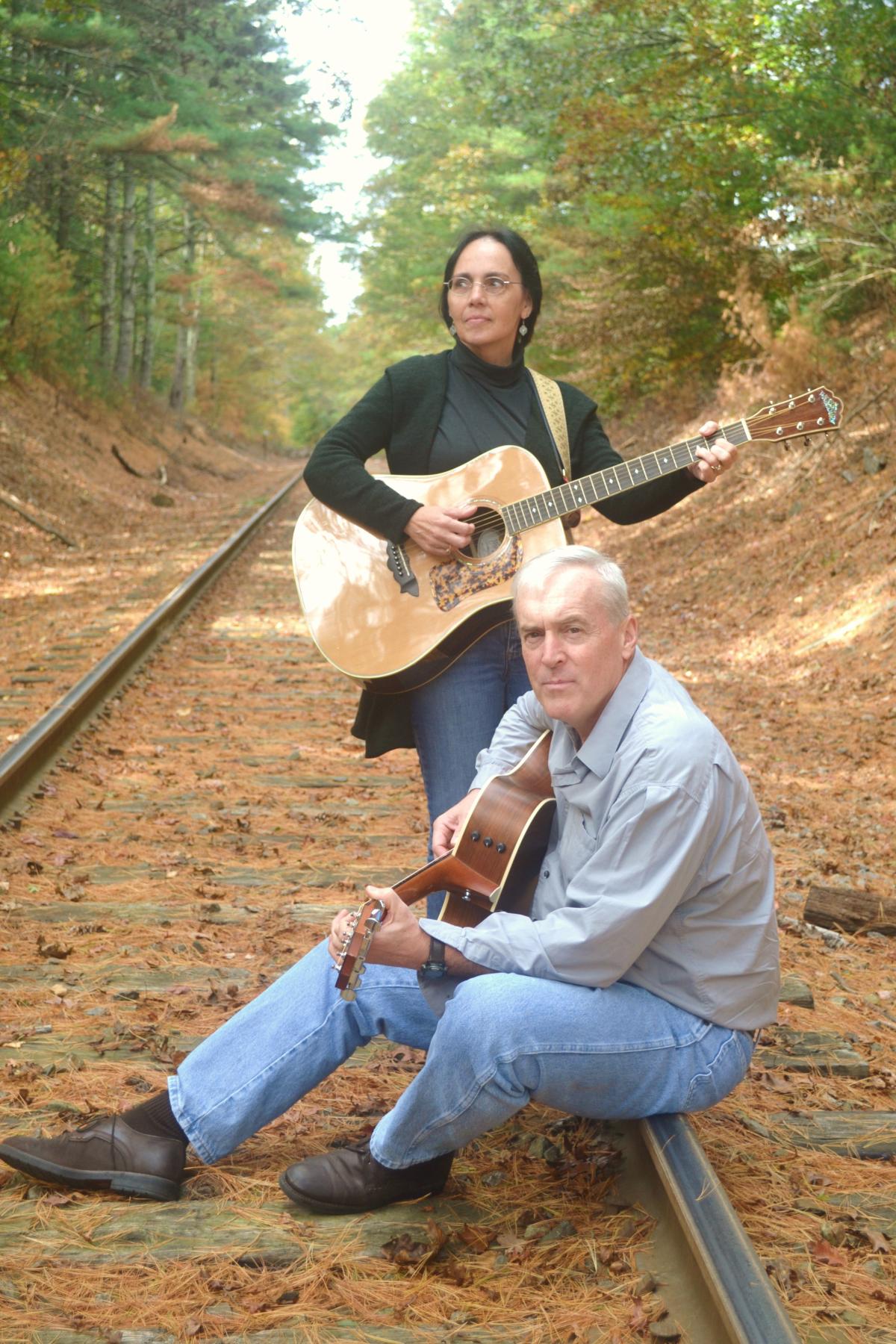 Andy and Judy on railroad tracks